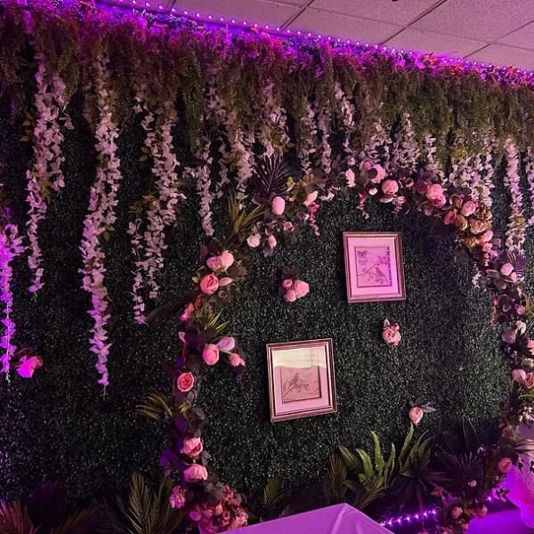 Escape room party photo backdrop with purple lighting in Vaughan for birthdays and events