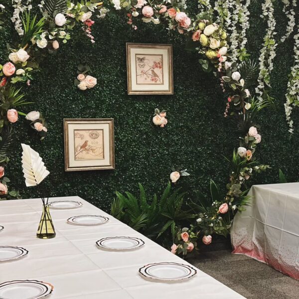 Escape room party room setup with floral backdrop in Vaughan for birthday and group events